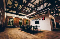 boardroom w logo photo-1503418895522-46f9804cda40 copy